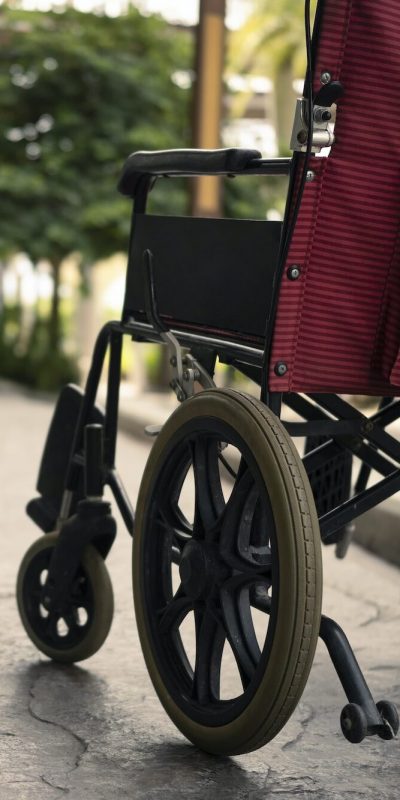 Empty wheelchair parked in hospital. Health care and insurance concept.